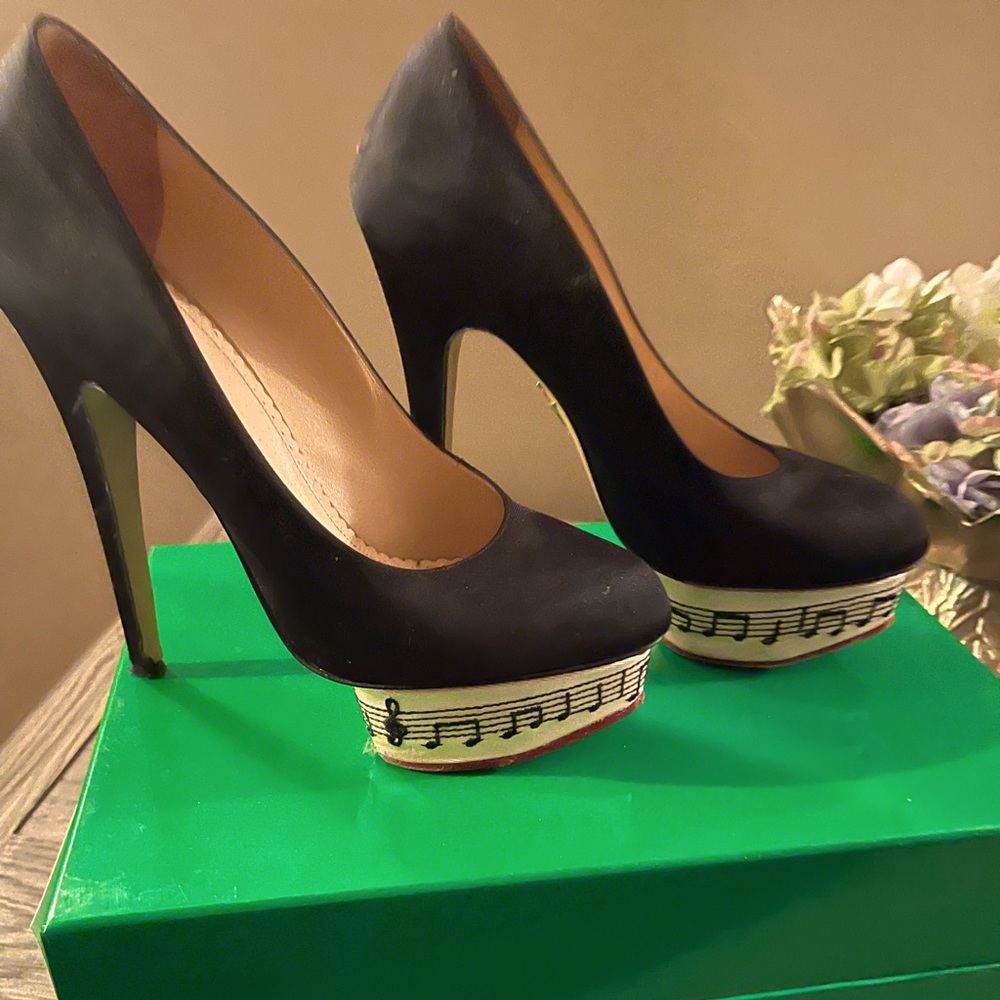 Super rare and sky high Charlotte Olympia Music Note Pumps